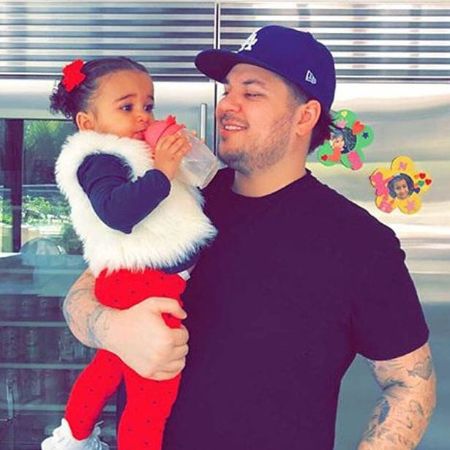 Rob Kardashian poses with her daughter.